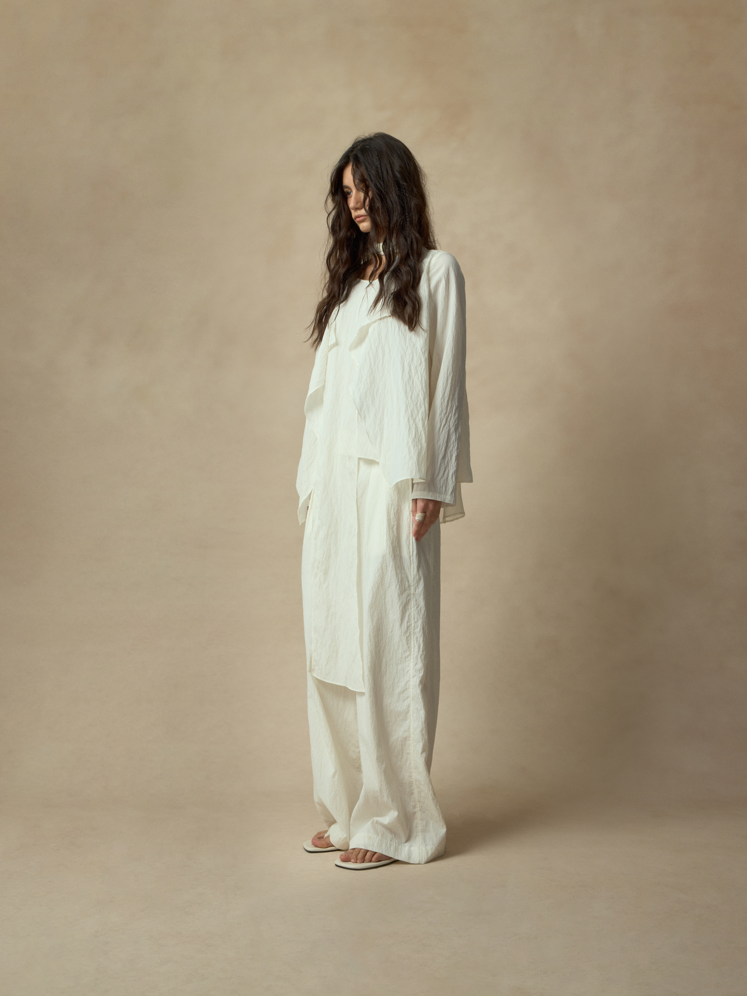 White Asymmetrical Dry Silk Crew Neck Shirt