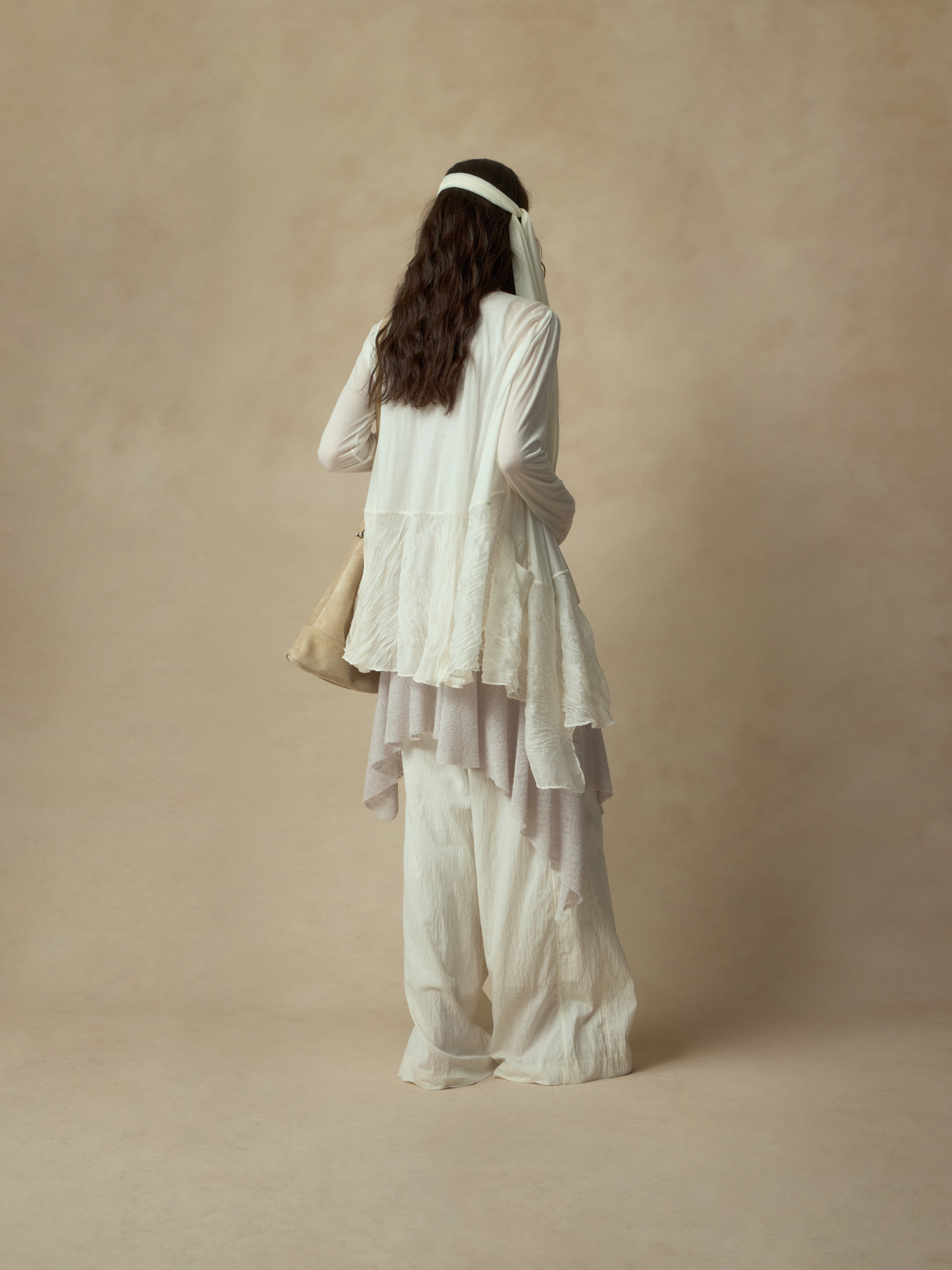 ホワイトの不規則なパッチワークカーディガン