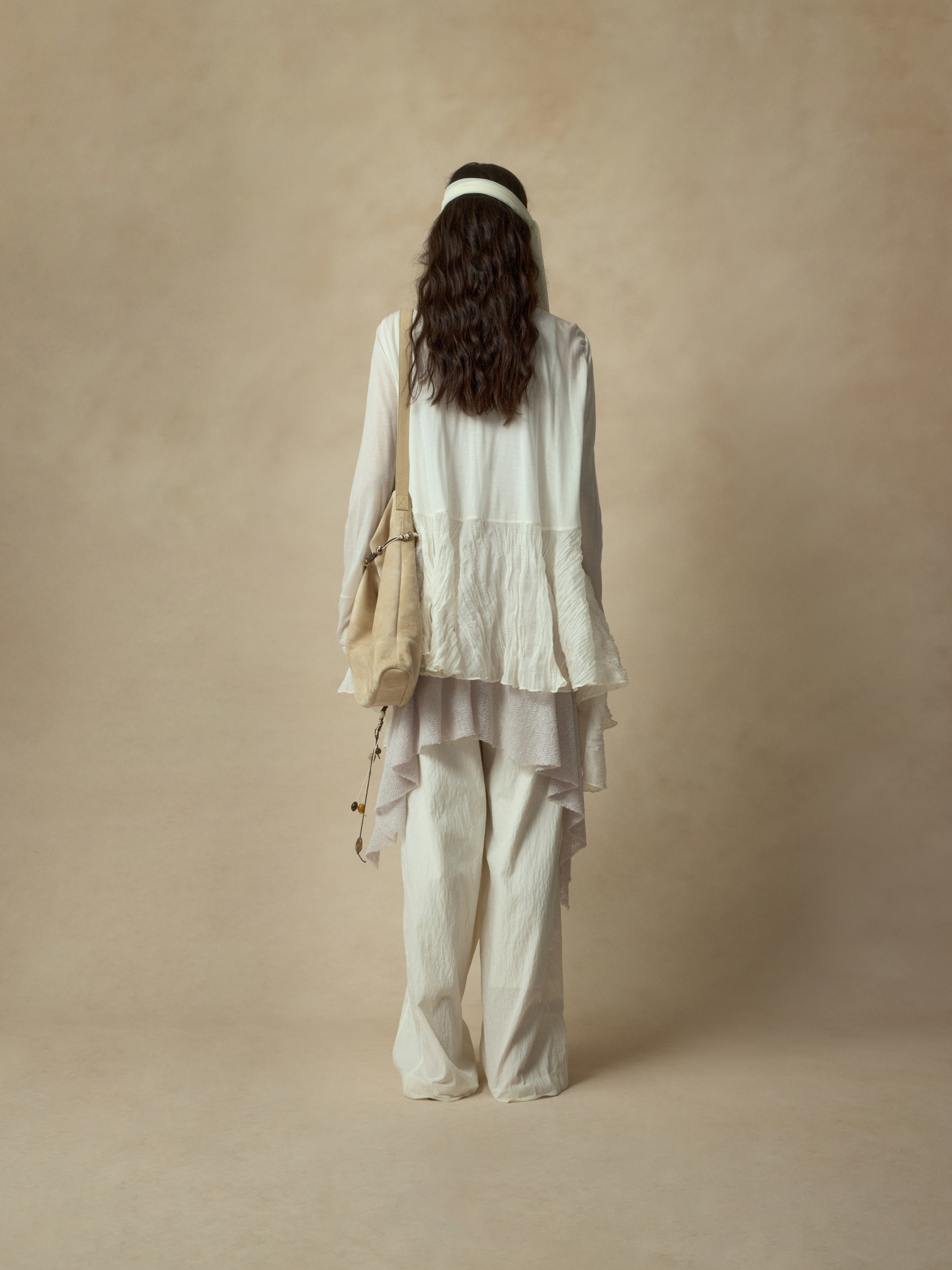 ホワイトの不規則なパッチワークカーディガン